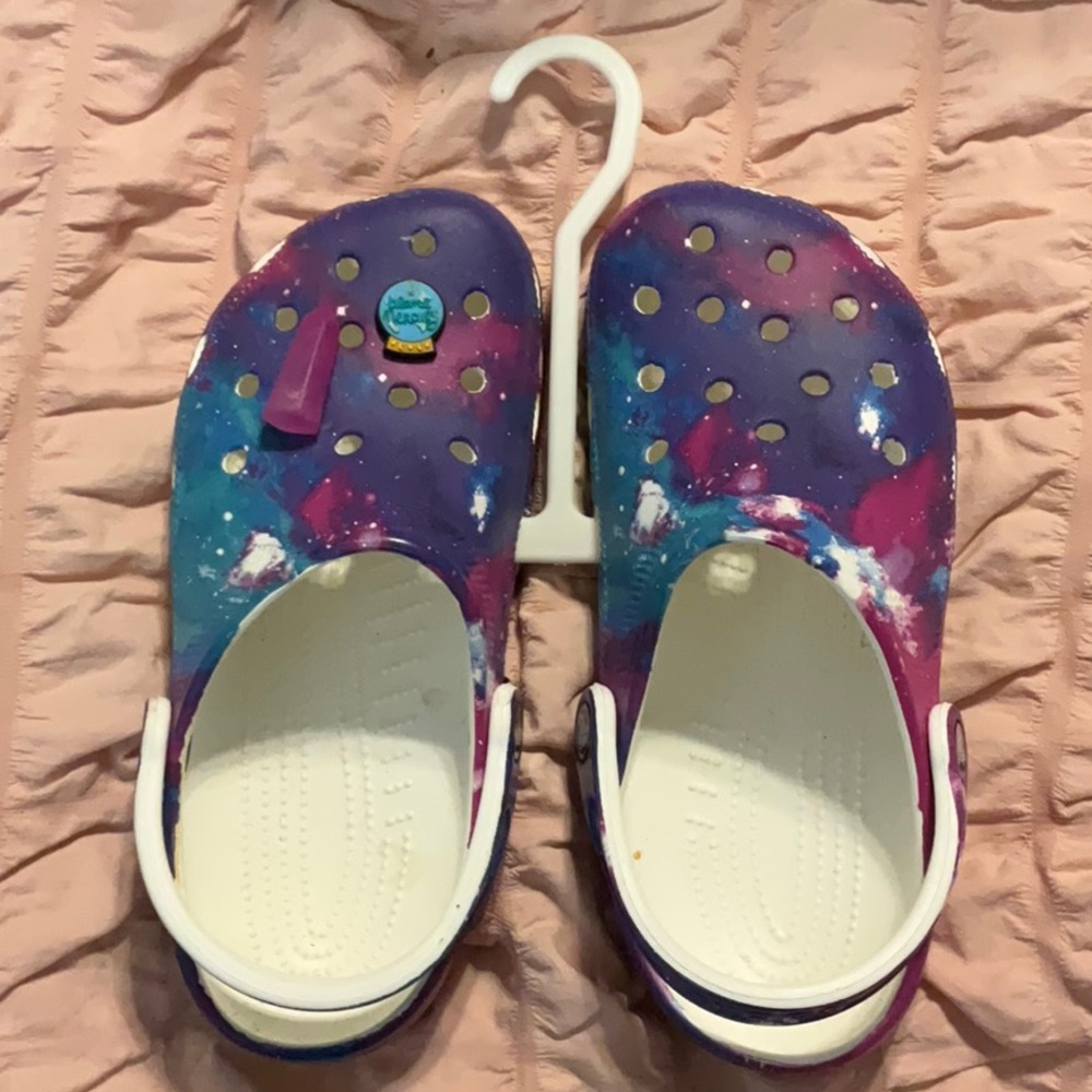 Blue and purple size 7 galaxy crocs with jibbitz